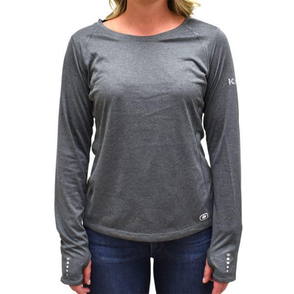 Gray long-sleeve athletic shirt with Kirby logo on the sleeve, worn by a person.