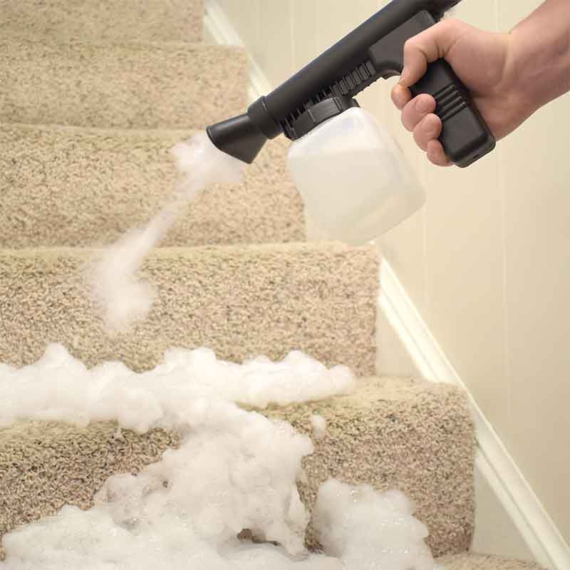 Use the portable shampooer to shampoo carpeted steps.