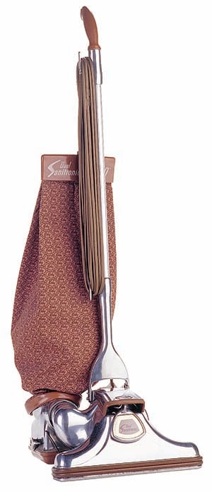 Kirby vacuum cleaner, silver body, maroon bag, wooden handle.