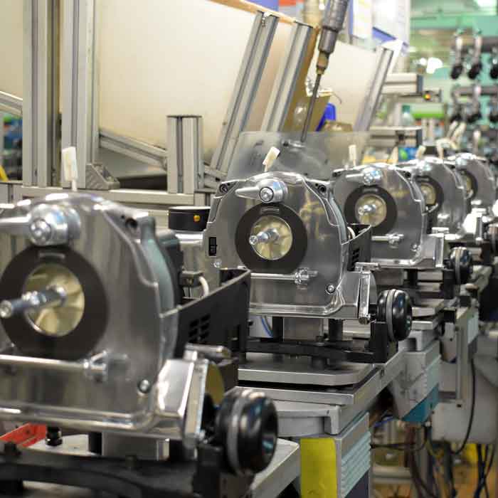 Kirby vacuum assembly line with aluminum components.